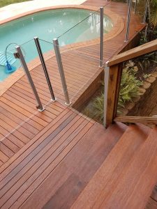 Deck rejuvenation and re-coating using acrylic decking oil